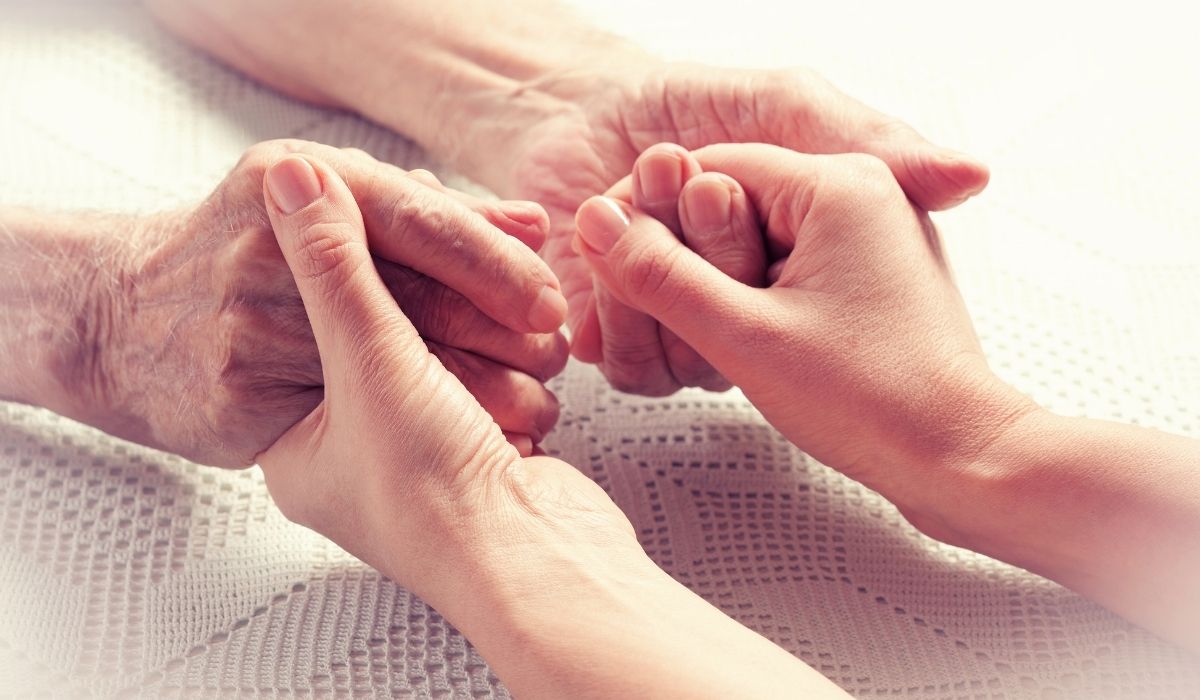 Elderly resident receiving attentive 24/7 medical and clinical care from professional healthcare staff at Lamset Haya Elderly Care.