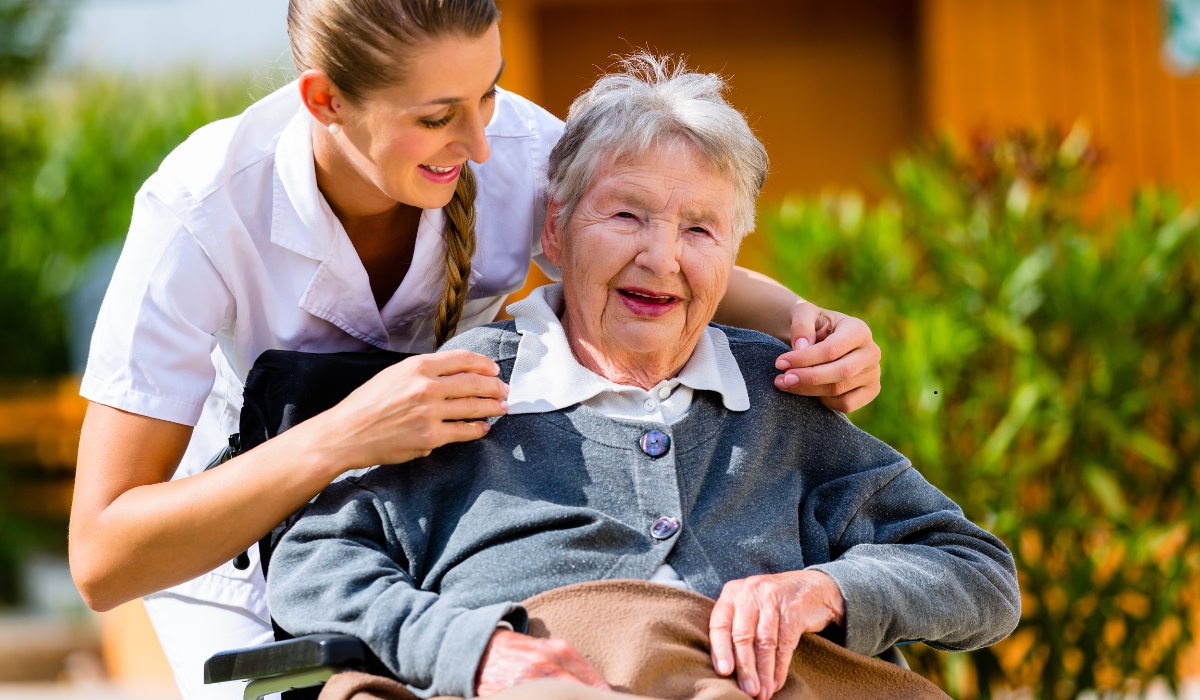 Elderly patient receiving compassionate 24/7 emergency care from a skilled nurse at Lamset Haya Elderly Care